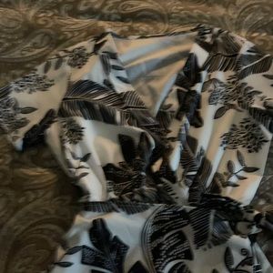 Black and white romper. 100% polyester. NBW.